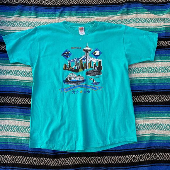 Vintage 2000 Seattle Washington People and Nature in Harmony Teal Shirt Sz XL - Picture 1 of 5